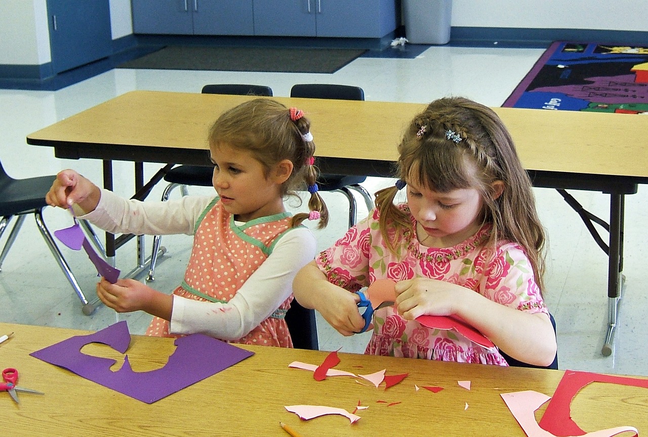 Students cutting construction paper